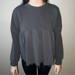 Black long sleeve peplum top